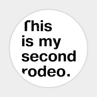 "This is my second rodeo." in plain white letters - cos you're not the noob, but barely Magnet